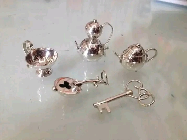 Dijes variados's foto | Soteras Joyería |  BizneCubano