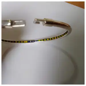 Pulso rígido con ildee dentro miniatura 3